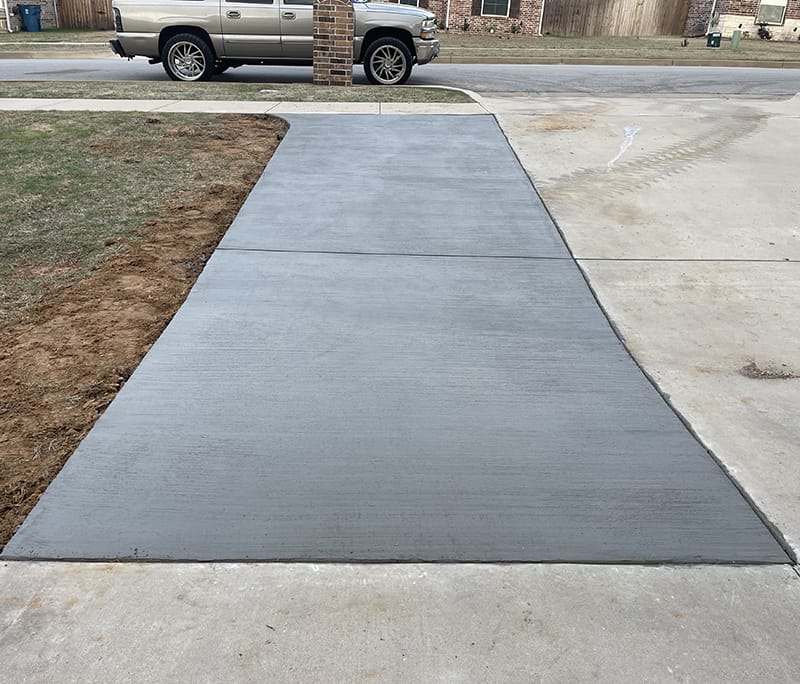 New concrete sidewalk section installation